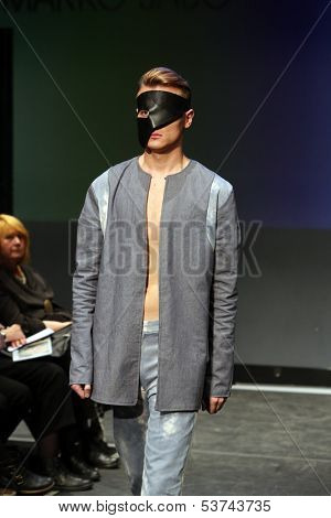 ZAGREB, CROATIA - NOVEMBER 07: Fashion model wearing clothes designed by Marko Sabo on the Fashion Wardrobe show on November 07, 2013 in Zagreb, Croatia.