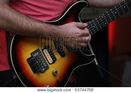 Guitarist plays