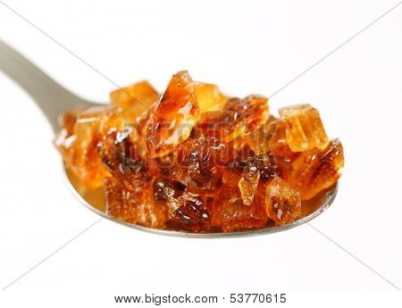 detail of teaspoon with brown candy sugar