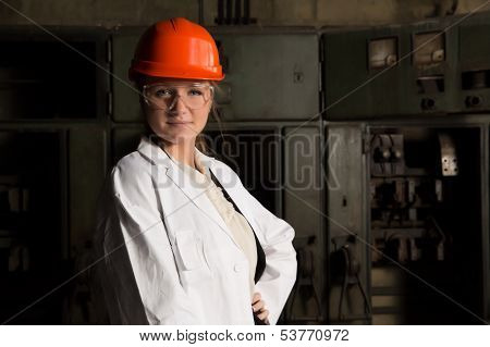 Girl Worker In The Factory