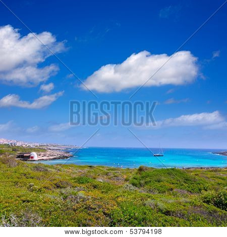 Binibeca beach in Menorca at Binibequer Vell village of Balearic islands