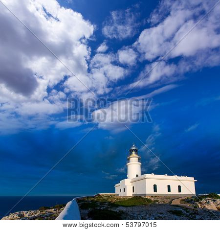 Menorca sunset in Faro Far de Caballeria Lighthouse at Balearic Islands es Mercadal