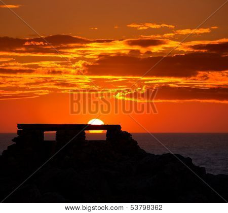 Ciutadella Menorca at Punta Nati orange sunset in Baearic Islands