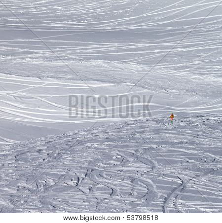 Traces Of Skis And Snowboards In New Fallen Snow And Warning Sign On Off-piste Slope