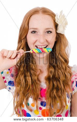 Pretty girl with lollypops isolated on white