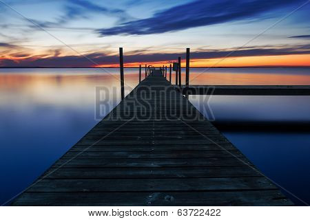 Landing Stage By The Sea At Sunset