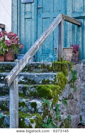 Romantic Door with weathered Steps