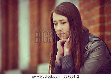 Thoughtful Depressed Young Woman