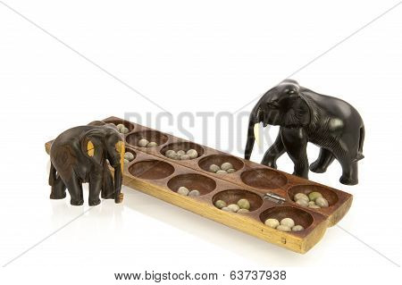 Carved Elafants And Awale Game