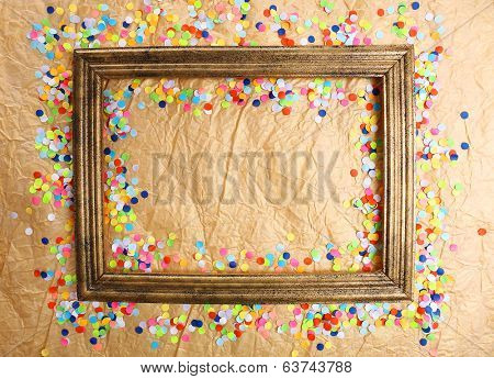 Photoframe with confetti on paper background