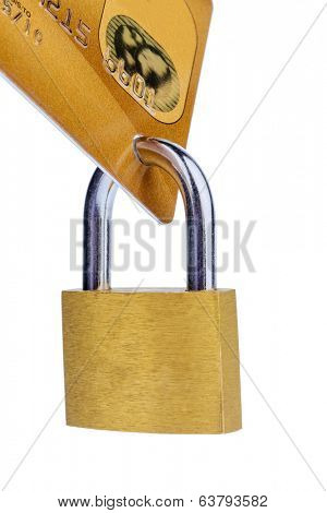 a golden credit card and padlock. symbolic photo for cashless purchases and status symbols.