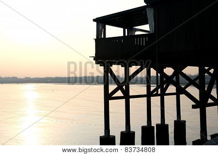 Large Wooden Stilt House On The Seashore