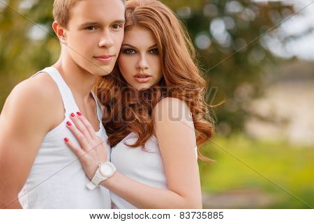 Young couple in love spending time together outside the city.