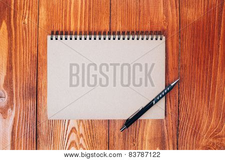 Notepad with pen