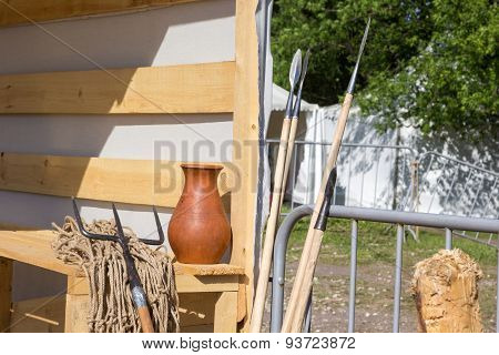 Gladiatorial Net And Trident On Wooden Bench