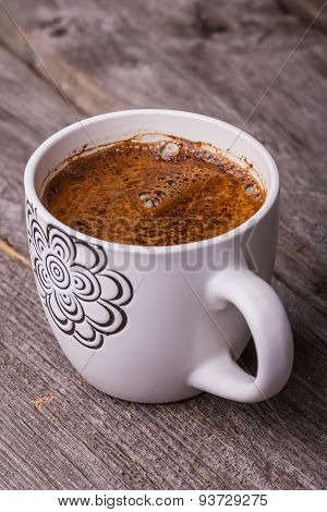 Cup Of Coffee On Wooden Background