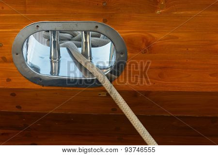Stainless Steel Fairlead On A Wooden Yacht