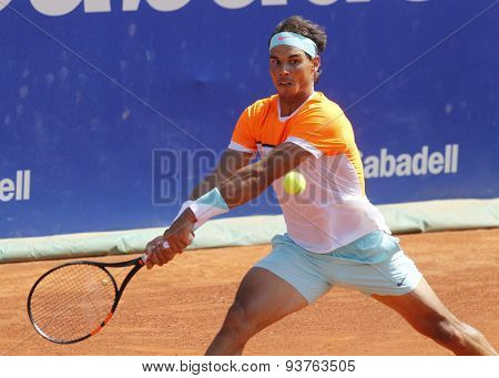 BARCELONA - APRIL, 23: Spanish tennis player Rafa Nadal in action during a match of Barcelona tennis tournament Conde de Godo on April 23 2015 in Barcelona