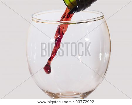 Red Wine Flow From A Green Bottle