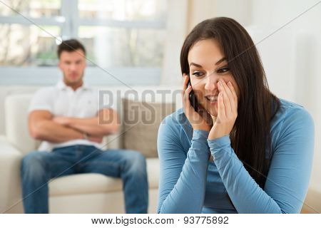 Woman Talking Privately On Cellphone