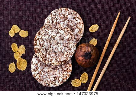 Puffed wheat cake and cornflakes. view from above