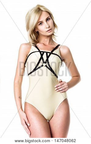 Blonde girl wearing bodysuit and black leather belt