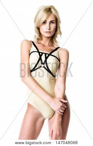 Blonde girl wearing bodysuit and black leather belt