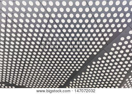 Abstract close-up view of metal dotted surface