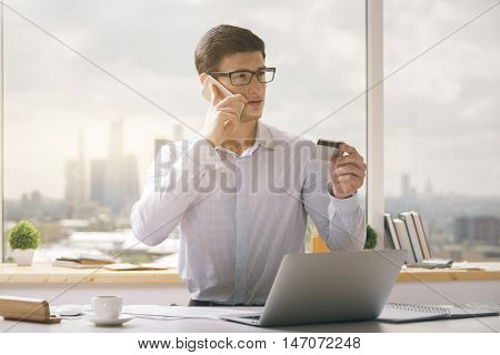 Young Businessman Making Online Order