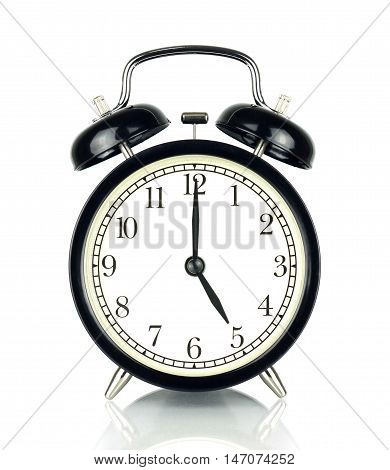 Alarm Clock isolated on white in black and white showing five o'clock.
