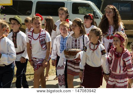 4 September 2016. Rakhiv Transcarpathian region Ukraine. Celebration - Festival Hutsul brynza . Colorful procession - parade of people dressed in national costumes. Children continue national traditions