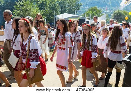 4 September 2016. Rakhiv Transcarpathian region Ukraine. Celebration - Festival Hutsul brynza . Colorful procession - parade of people dressed in national costumes. Children continue national traditions