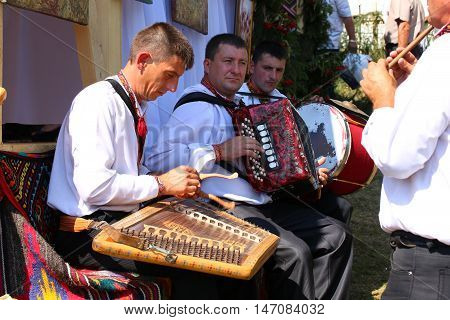 4 September 2016. Rakhiv Transcarpathian region Ukraine. Celebration - Festival Hutsul brynza . People dressed in national costumes. Folklore ensemble playing on national musical instruments