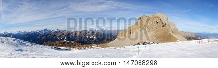 The panorama of ski and skiers at Passo Groste ski area Madonna di Campiglio Italy
