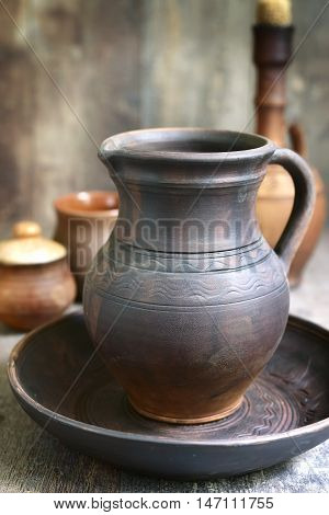 Homemade Pottery On A Rustic Wooden Background .