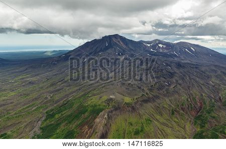 Maly Semyachik is a stratovolcano. Kronotsky Nature Reserve on Kamchatka Peninsula. View from helicopter.