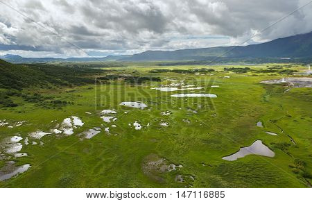 Uzon Caldera in Kronotsky Nature Reserve on Kamchatka Peninsula. View from helicopter.