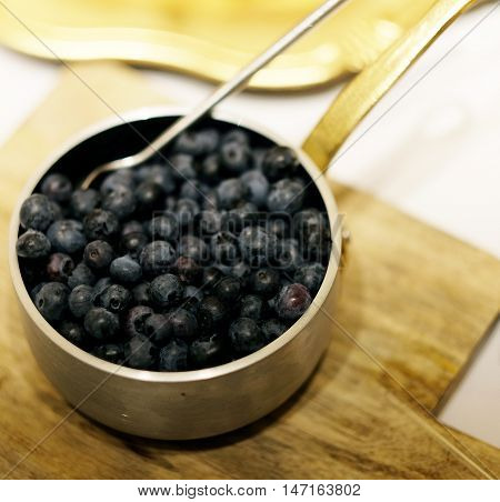 Bowl of bilberries or blueberries, Healthy food Bilberries in a bowl, blueberries in a bowl. Fresh blueberries close up. Bilberries close up