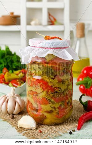 Homemade canning winter preserve of spiced sweet peppers and garlic