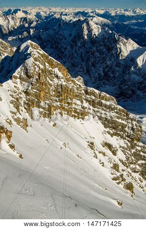 Beautiful View From Highest Mountain Peak Zugspitze Near Garmisch Partenkirchen. Cold Winter Day Wit