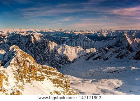 Beautiful View From Highest Mountain Peak Zugspitze Near Garmisch Partenkirchen. Cold Winter Day Wit