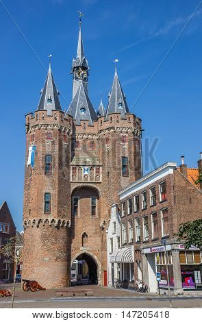 ZWOLLE, NETHERLANDS - AUGUST 31, 2016: Old city gate Sassenpoort and cannon in Zwolle, Netherlands