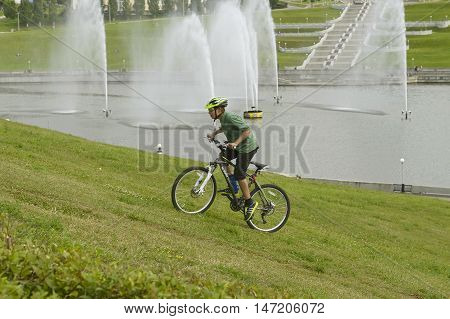 May 9 2015: Photo of cyclist up the hill in Cheboksary. Chuvashia. Russia.