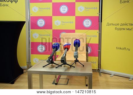 MOSCOW - JUN 03, 2015: Microphones before Oleg Tinkoff interview. Oleg Tinkoff is popular and successful Russian businessman