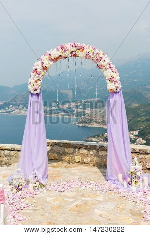 beautiful wedding arch for the ceremony of flowers.