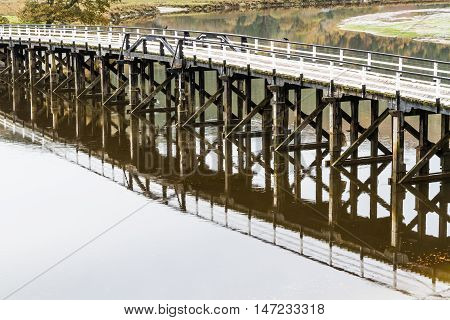Wooden structure Penmaenpool toll bridge over the River Mawddach near Dolgellau Wales United Kingdom