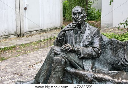 POLAND, KRAKOW - MAY 27, 2016: Statue of polish diplomat Jan Karski in the Kazimierz Jewish district of Krakow. Near to the Remuh Synagogue.
