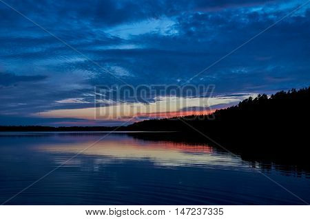 Beautiful panoramic view of the sunset over Lemiet lake in Mazury lake district, Poland. Lake landscape at sunset, fantastic travel destination. Masuria Polish: About this sound Mazury, German: Masuren is a region in northern Poland famous for its 2, 000 