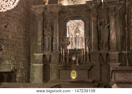 POLAND, WIELICZKA - MAY 28, 2016: Wieliczka Salt Mine. In UNESCO World Heritage since 1978. Alter in St. Kinga's Chapel