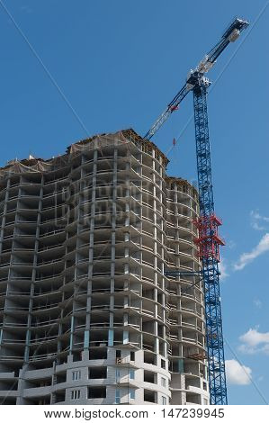 construction of high-rise buildings. Construction crane. view from below.
